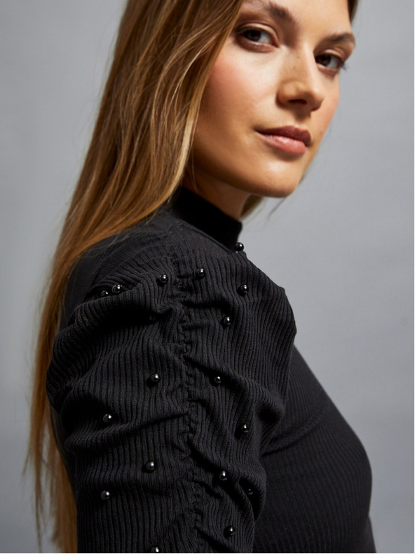 Moodo Camicetta nera da donna a coste con maniche a sbuffo e dolcevita Moodo