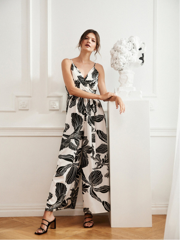 Moodo Tuta bianca e nera con motivo tropicale Moodo